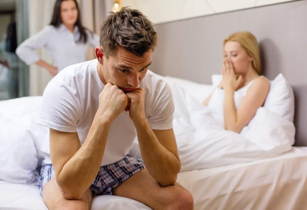 hotel, travel, relationships and sexual problems concept - wife caught man cheating with another woman